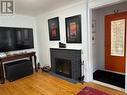 34 Durham Drive, St. Catharines (436 - Port Weller), ON  - Indoor Photo Showing Living Room With Fireplace 