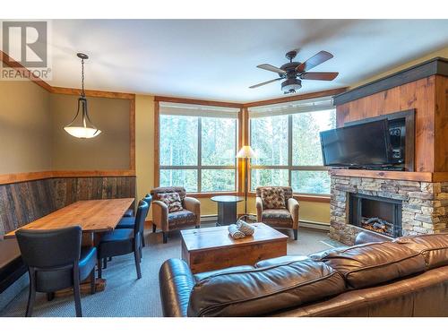 4559 Timberline Crescent Unit# 632A, Fernie, BC - Indoor Photo Showing Living Room With Fireplace