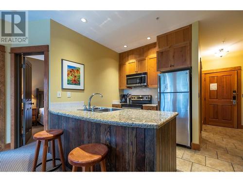 4559 Timberline Crescent Unit# 632A, Fernie, BC - Indoor Photo Showing Kitchen With Stainless Steel Kitchen With Double Sink