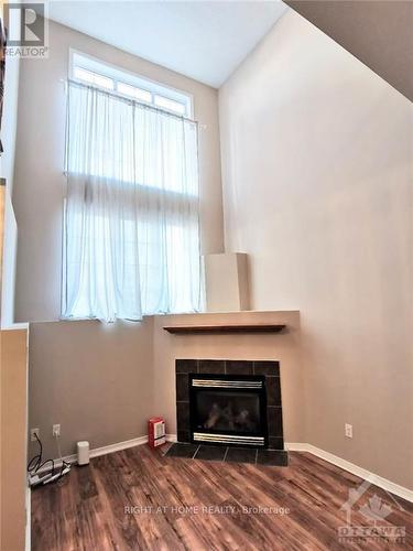 120 Gatestone, Ottawa, ON - Indoor Photo Showing Living Room With Fireplace