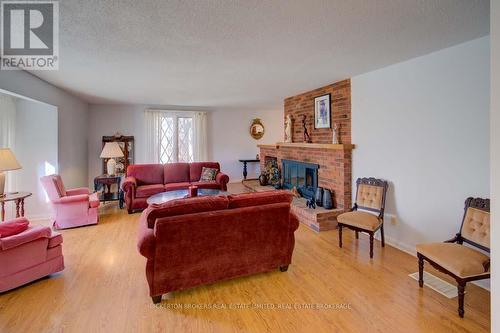 739 Sand Lake Road E, Rideau Lakes, ON - Indoor Photo Showing Living Room With Fireplace