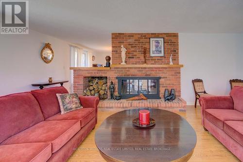 739 Sand Lake Road E, Rideau Lakes, ON - Indoor Photo Showing Living Room With Fireplace