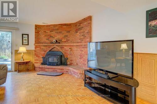 739 Sand Lake Road E, Rideau Lakes, ON - Indoor Photo Showing Living Room With Fireplace