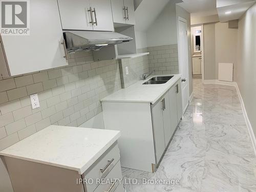 Basemen - 6 Fishing Crescent, Brampton, ON - Indoor Photo Showing Kitchen With Double Sink