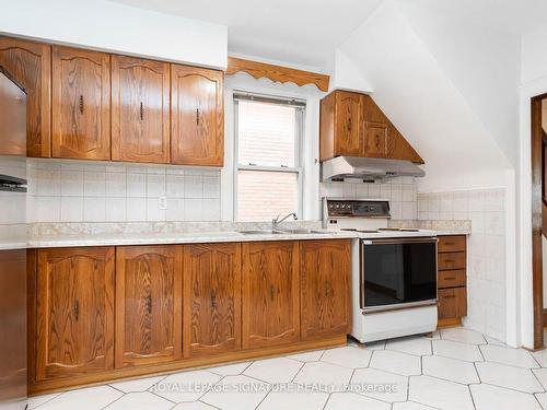 214 Mortimer Ave, Toronto, ON - Indoor Photo Showing Kitchen With Double Sink