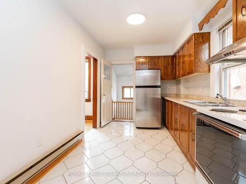 214 Mortimer Ave, Toronto, ON - Indoor Photo Showing Kitchen With Double Sink