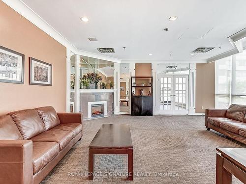 1203-75 King St E, Mississauga, ON - Indoor Photo Showing Living Room With Fireplace