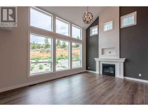 8759 Badger Drive, Kamloops, BC - Indoor Photo Showing Other Room With Fireplace