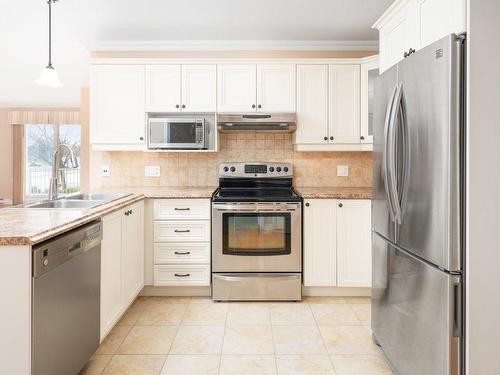 Kitchen - 295 Rue De Barcelone, Dollard-Des-Ormeaux, QC - Indoor Photo Showing Kitchen With Double Sink