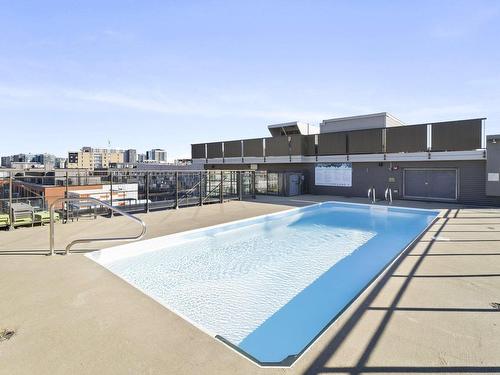 Pool - 613-1811 Rue William, Montréal (Le Sud-Ouest), QC - Outdoor With In Ground Pool