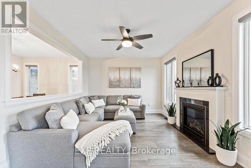 3004 Sierra Drive W, Orillia, ON - Indoor Photo Showing Living Room With Fireplace