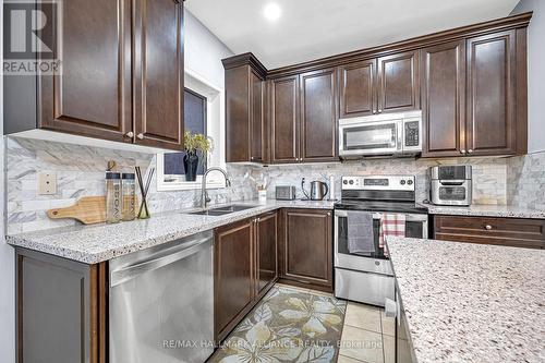 4716 Doug Wright Drive, Burlington, ON - Indoor Photo Showing Kitchen With Stainless Steel Kitchen With Double Sink