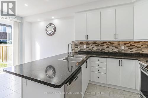 1516 Farmstead Drive, Milton, ON - Indoor Photo Showing Kitchen With Double Sink