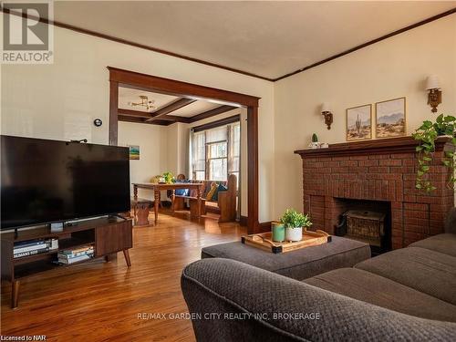 69 Dufferin Street, St. Catharines (451 - Downtown), ON - Indoor Photo Showing Living Room With Fireplace