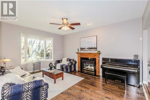 72 Kenins Crescent, Ottawa, ON - Indoor Photo Showing Living Room With Fireplace