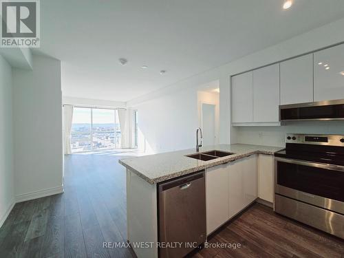 1114 - 1050 Main Street E, Milton, ON - Indoor Photo Showing Kitchen With Double Sink