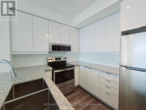 1114 - 1050 Main Street E, Milton, ON - Indoor Photo Showing Kitchen With Stainless Steel Kitchen With Double Sink With Upgraded Kitchen