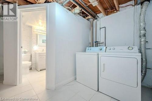 Clothes washing area featuring washer and clothes dryer - 175 Cedarbrae Avenue, Waterloo, ON - Indoor Photo Showing Laundry Room