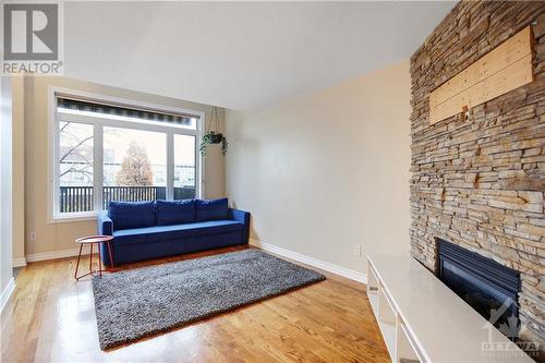 92 Carwood Circle, Ottawa, ON - Indoor Photo Showing Living Room With Fireplace