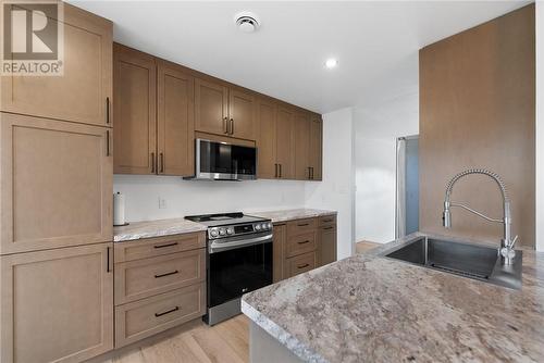 3959 Macmillan Drive, Val Caron, ON - Indoor Photo Showing Kitchen