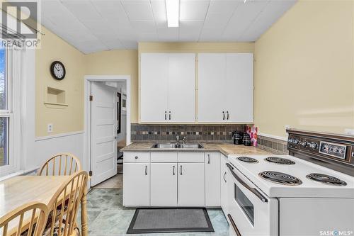 2 1St Street E, Langham, SK - Indoor Photo Showing Kitchen With Double Sink