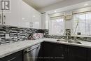 81 - 50 Strathaven Drive, Mississauga, ON  - Indoor Photo Showing Kitchen With Double Sink With Upgraded Kitchen 