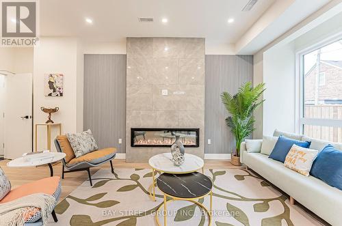 850 Cosburn Avenue, Toronto, ON - Indoor With Fireplace