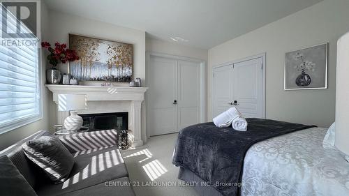 23 Finesse Court, Richmond Hill, ON - Indoor Photo Showing Bedroom With Fireplace