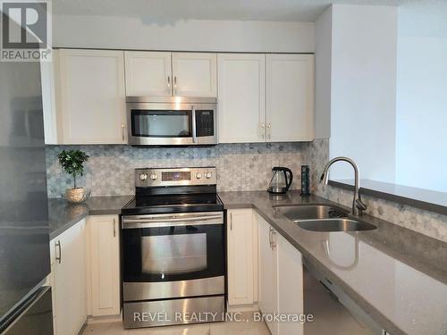 1005 - 2155 Burnhamthorpe Road W, Mississauga, ON - Indoor Photo Showing Kitchen With Double Sink