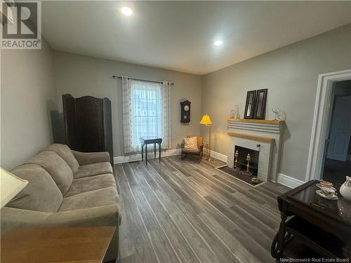 20 Floral Avenue, Sussex, NB - Indoor Photo Showing Living Room With Fireplace