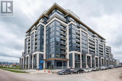 103 - 405 Dundas Street W, Oakville, ON - Outdoor With Facade