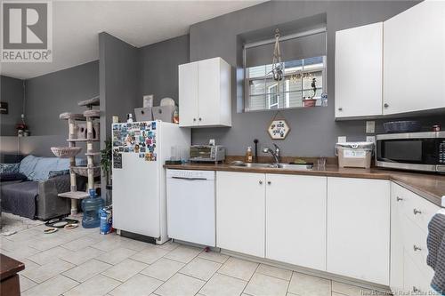 585-587 Pierre, Dieppe, NB - Indoor Photo Showing Kitchen With Double Sink