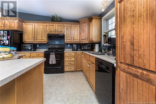 585-587 Pierre, Dieppe, NB - Indoor Photo Showing Kitchen With Double Sink