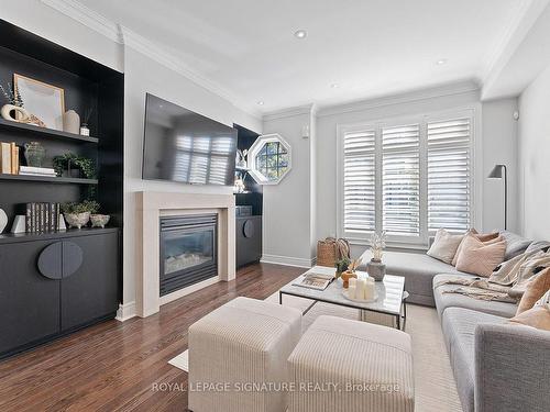 76 Lobo Mews, Toronto, ON - Indoor Photo Showing Living Room With Fireplace