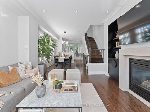 76 Lobo Mews, Toronto, ON - Indoor Photo Showing Living Room With Fireplace