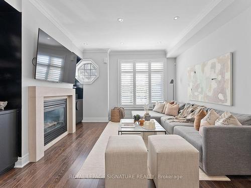 76 Lobo Mews, Toronto, ON - Indoor Photo Showing Living Room With Fireplace