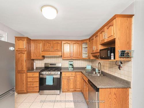 62 East 14Th St, Hamilton, ON - Indoor Photo Showing Kitchen With Double Sink