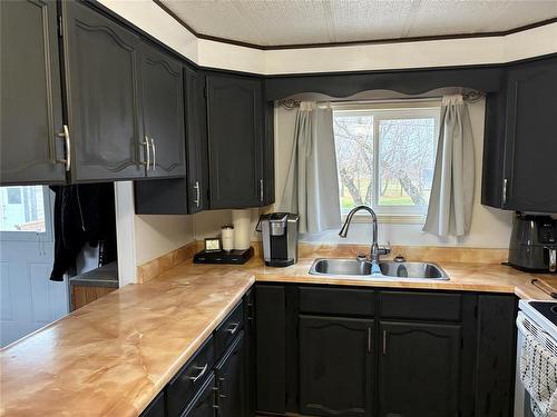 275 Alice Avenue, Miniota, MB - Indoor Photo Showing Kitchen With Double Sink