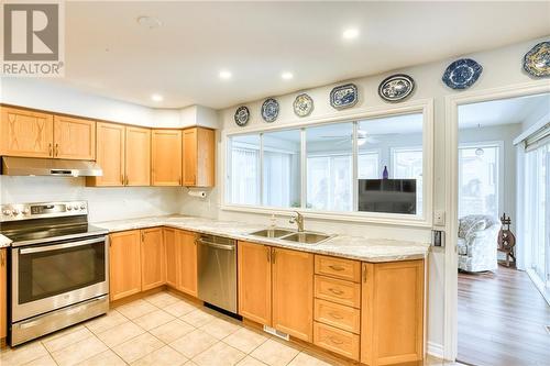 Kitchen entry view ... - 51 Decaria Boulevard, Perth, ON - Indoor Photo Showing Kitchen With Double Sink