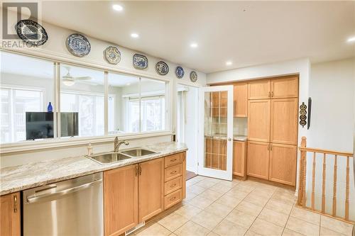 View to pantry + sunroom entry ... - 51 Decaria Boulevard, Perth, ON - Indoor Photo Showing Kitchen With Double Sink