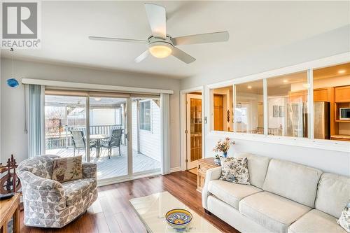 Sunroom view to deck access ... - 51 Decaria Boulevard, Perth, ON - Indoor Photo Showing Living Room