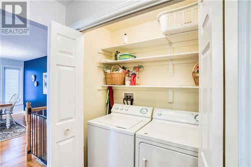 Ultra convenient main floor laundry ... - 51 Decaria Boulevard, Perth, ON - Indoor Photo Showing Laundry Room