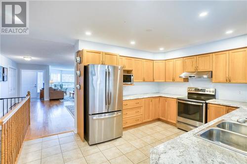 Entry to kitchen ... - 51 Decaria Boulevard, Perth, ON - Indoor Photo Showing Kitchen With Double Sink