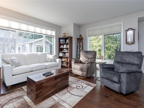 301-590 Bezanton Way, Colwood, BC - Indoor Photo Showing Living Room