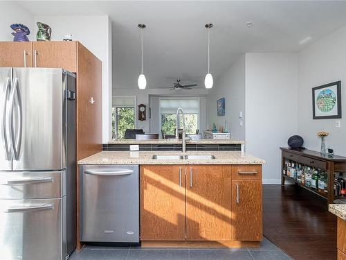 301-590 Bezanton Way, Colwood, BC - Indoor Photo Showing Kitchen With Double Sink