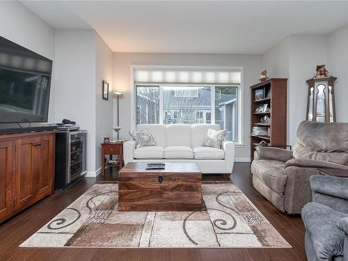 301-590 Bezanton Way, Colwood, BC - Indoor Photo Showing Living Room