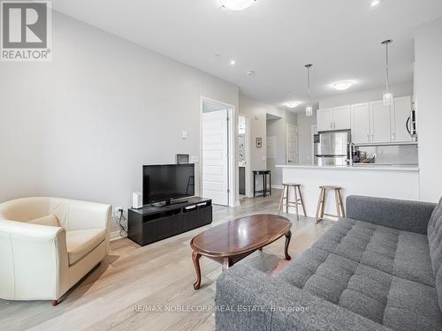 516 - 50 Kaitting Trail, Oakville, ON - Indoor Photo Showing Living Room