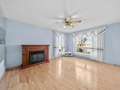 Salon - 455 10E Rang E., Saint-Nazaire-D'Acton, QC - Indoor Photo Showing Living Room With Fireplace