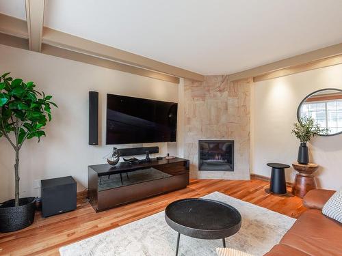 Salle familiale - 3045 Rue Michaud, Brossard, QC - Indoor Photo Showing Living Room With Fireplace