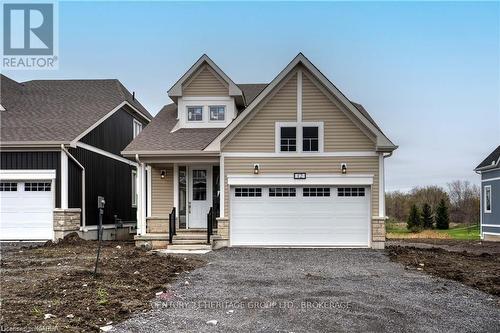 12 Oakmont Drive, Loyalist (Bath), ON - Outdoor With Facade